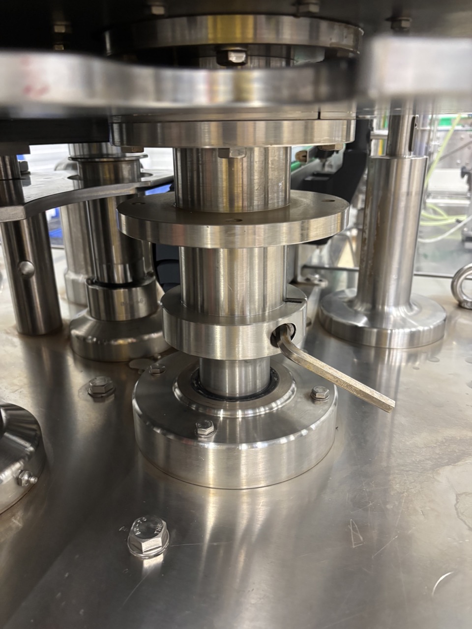 Lower starwheel screw facing forward — this is the first screw to loosen