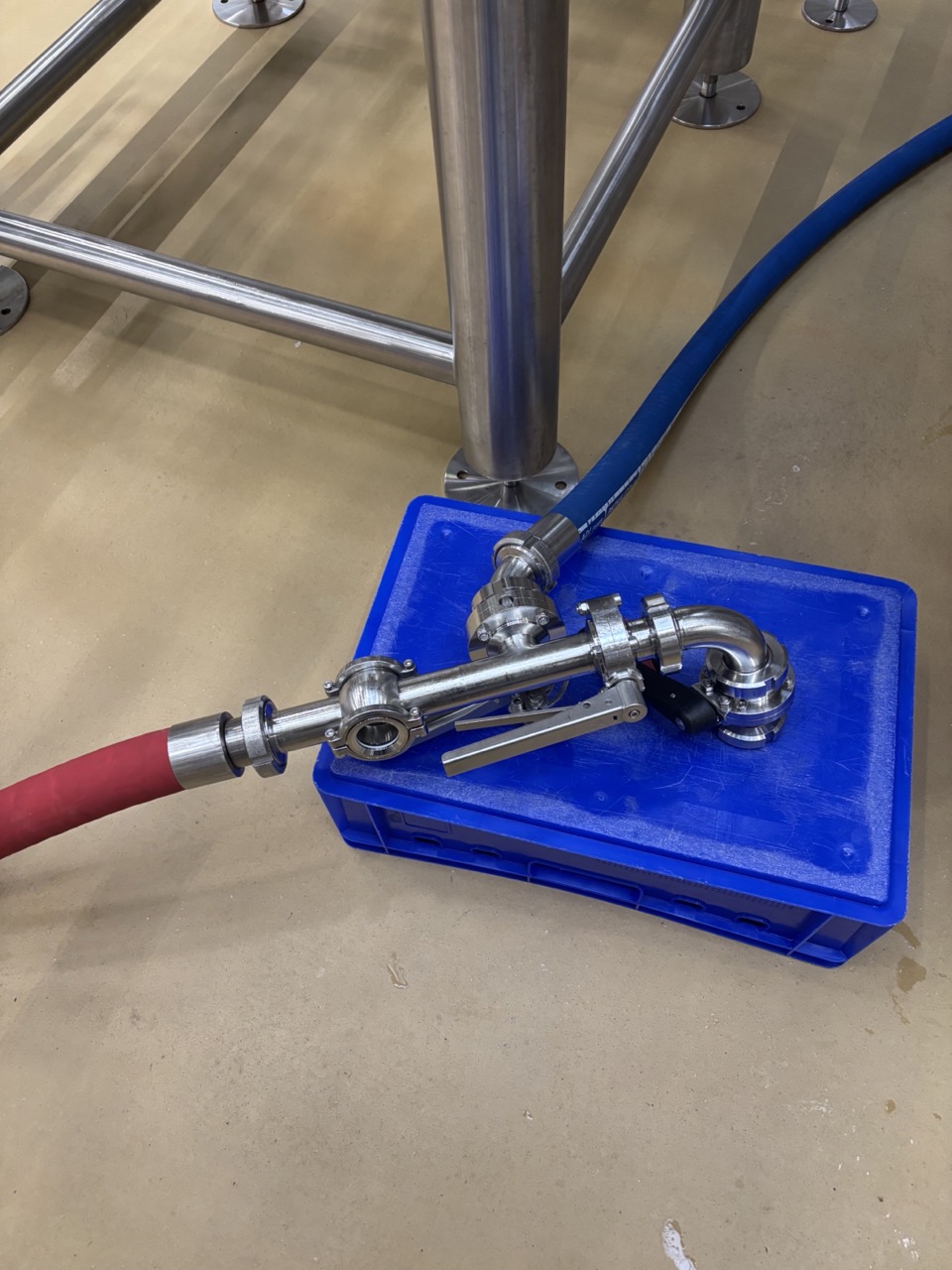 T-piece on blue box — both elbows fitted, extra valve on tank-facing end
